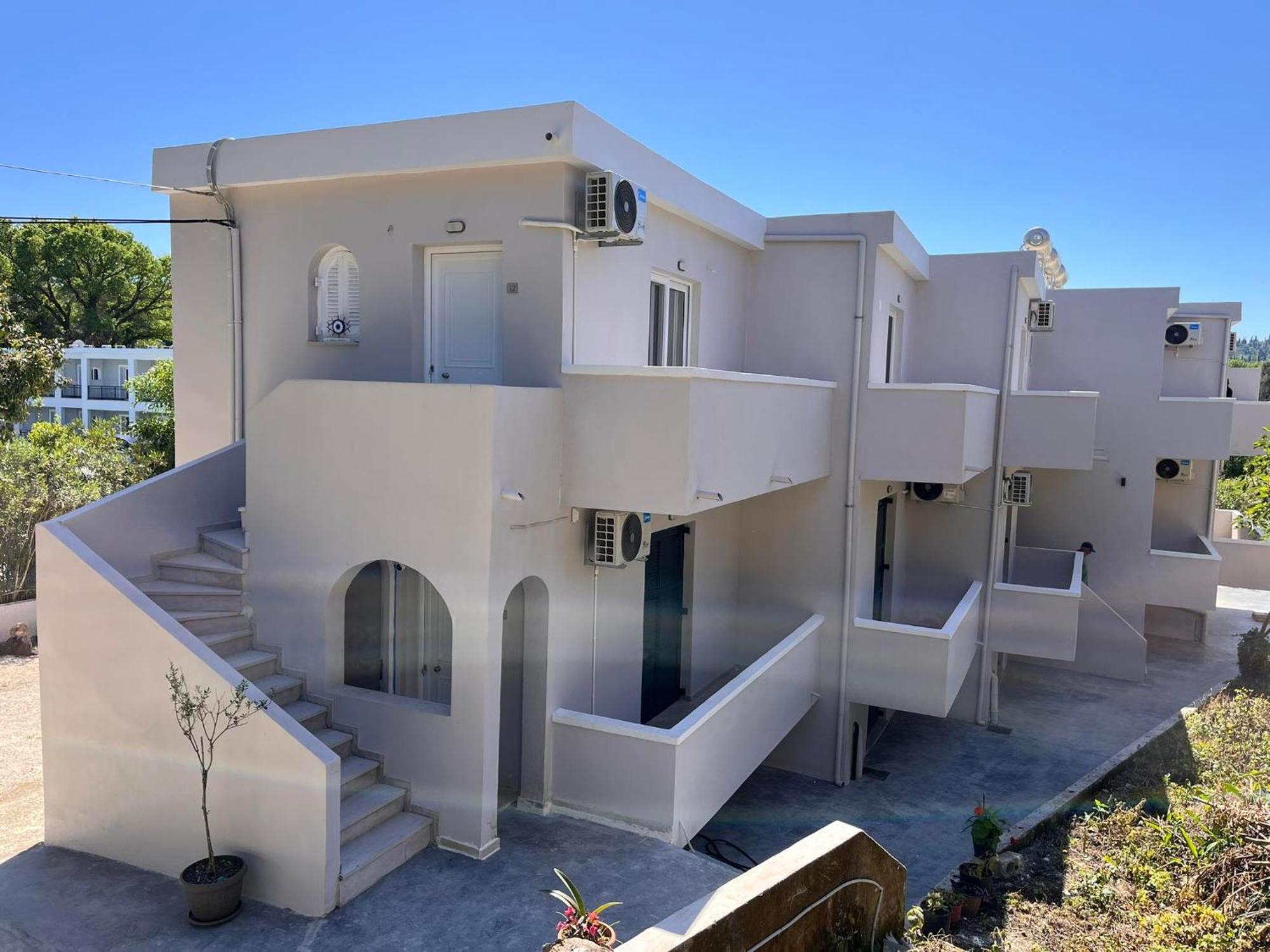 Nisea Apartments Ipsos Exterior photo